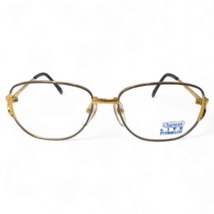 Front view of Charmant Lite Titanium women's square eyeglasses in grey with a gold bridge.